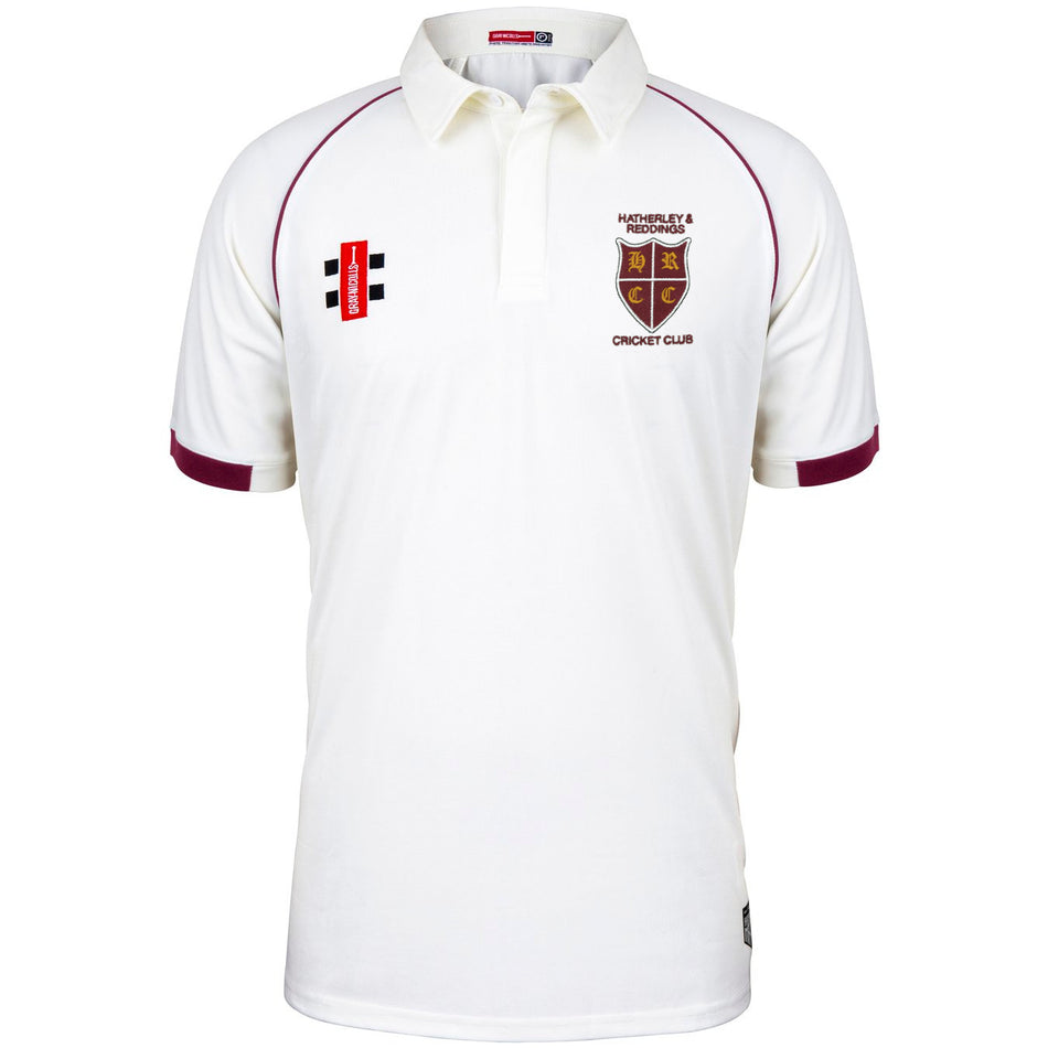 A white Hatherley & Reddings CC Matrix V2 Short Sleeve Match Shirt by Martin Berrill Sports, featuring maroon trim, moisture-wicking fabric, embroidered logos, and the club crest on the chest.
