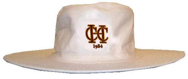 The Hawkesbury Upton CC Fielders Sun Hat by Martin Berrill Sports is a white, wide-brimmed hat with the club logo—letters C C and 1984—in brown and gold on the front, designed to fit head sizes similar to standard helmets.