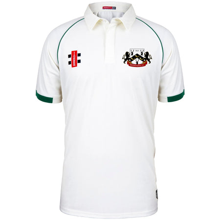 The Huntley CC Matrix V2 Short Sleeve Match Shirt by Martin Berrill Sports is a white cricket shirt with green sleeve trim, with two embroidered logos: a red and black Gray Nicolls patch on the left chest and a crest on the right.