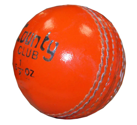 A bright orange Hunts County Club Cricket Ball with stitched seams and “County Club 1 5½ OZ” in black text on its surface, displayed against a white background.