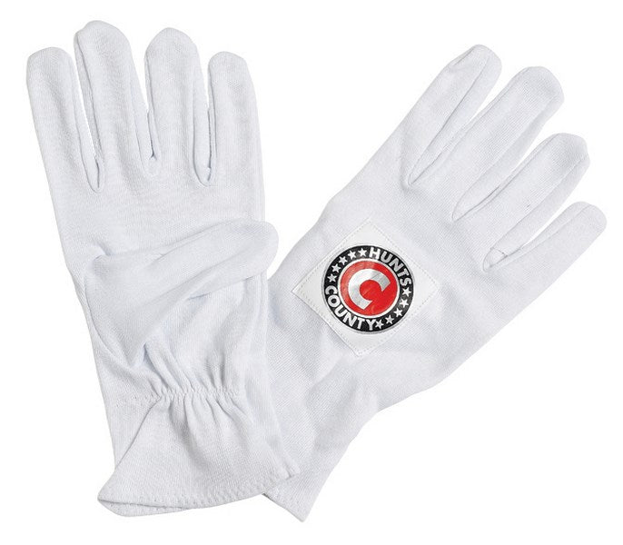 Hunts County Full Cotton Inners feature soft white cotton and a circular logo patch on the right wrist, offering breathable comfort for wicket keepers. Laid flat on a white background, they're perfect for every match.