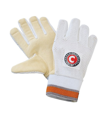 The Hunts County Padded Chamois WK Inner features a mesh back, chamois palm, and branded wrist with white, orange, and gray striped cuff for extra impact protection—an ideal wicket-keeping glove addition.