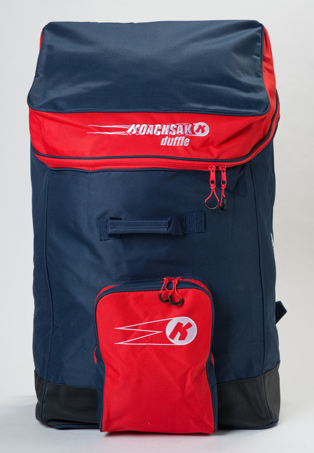 The Katchet KoachSak Duffle is a large, water-resistant bag featuring a blue body, red top flap and front pocket, white KoachSak branding and logo, sturdy rucksack handles, and red zippers, shown on a plain light background.