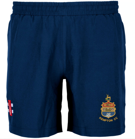 Gray Nicolls Kempton CC Velocity Training Shorts in navy blue feature an elastic waistband, Kempton CC crest and embroidery on the right leg, plus a red-and-white patch on the left—premium sportswear ideal for cricket training.
