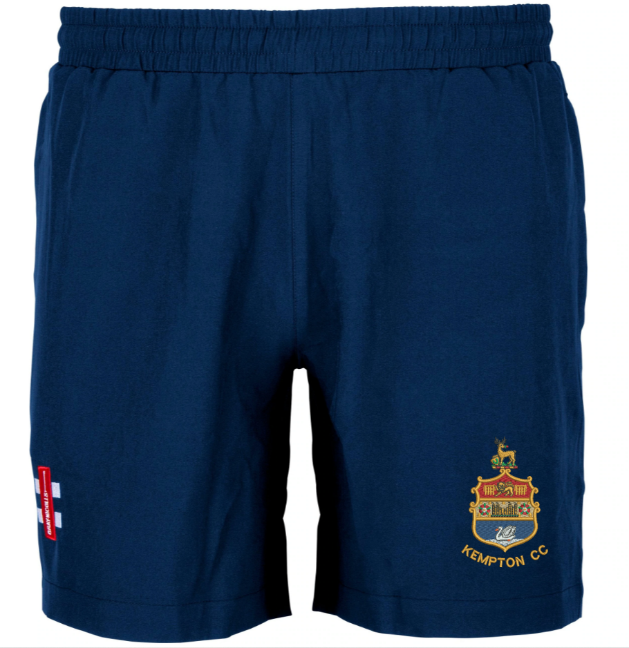 Gray Nicolls Kempton CC Velocity Training Shorts in navy blue feature an elastic waistband, Kempton CC crest and embroidery on the right leg, plus a red-and-white patch on the left—premium sportswear ideal for cricket training.