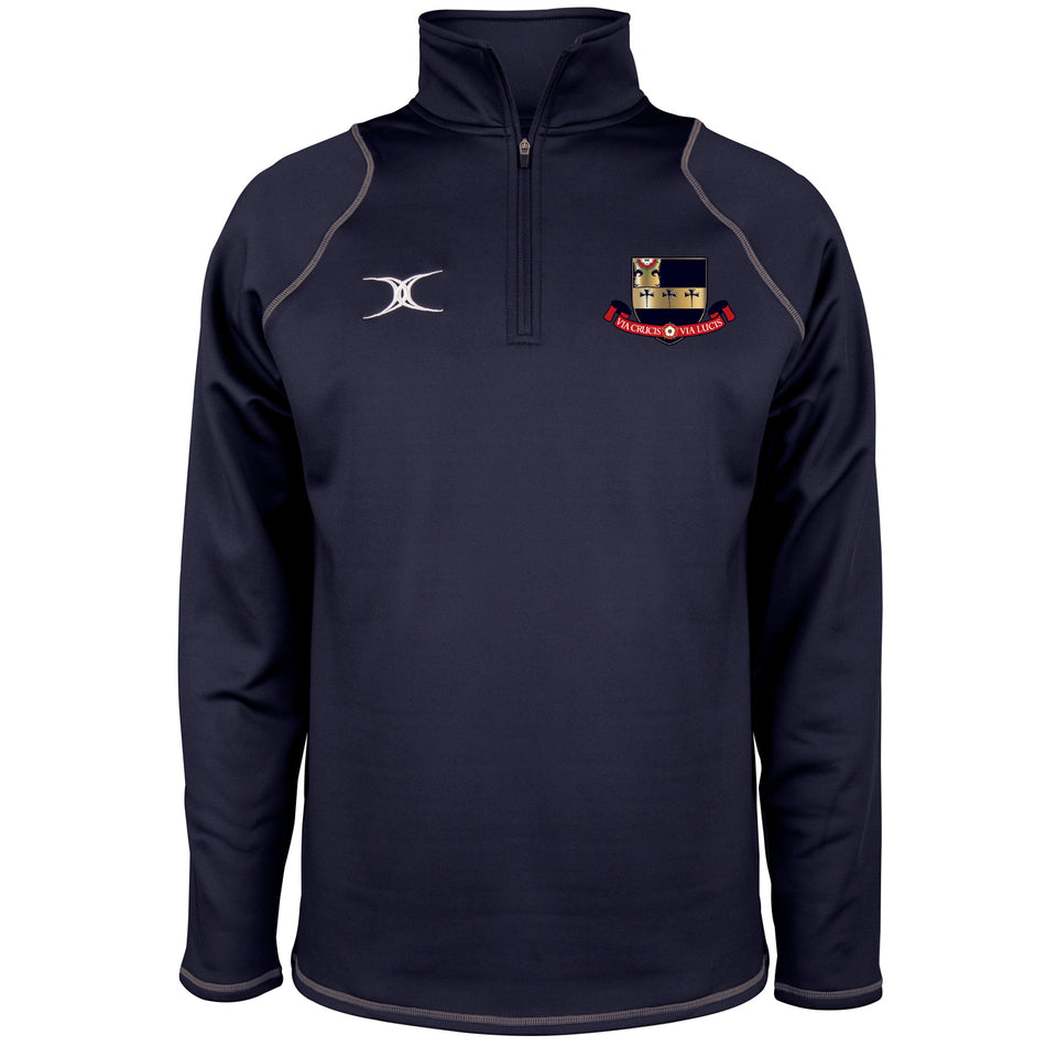 The Gilbert Kings School Quest Micro Fleece is a navy quarter-zip pullover in soft stretch fleece, featuring a left chest crest with red banner, white logo on the right, light gray piping, and a high collar for versatile fitness wear.