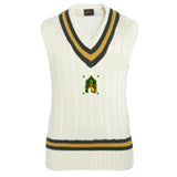 The Martin Berrill Sports Kingswood Village CC Cricket Slipover (Green/Gold/Green) is sleeveless and white, with black and yellow V-neck and hem stripes, featuring the club’s green and yellow crest with “KVC” embroidery.