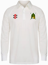 The Kingswood Village CC Matrix V2 Long Sleeve Shirt by Gray Nicolls is a white cricket shirt with moisture-wicking fabric, a collar, and two chest logos—one rectangular red on the left, and a green/yellow emblem on the right.