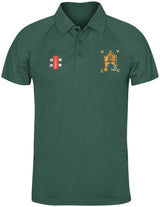 The Kingswood Village CC Matrix V2 Polo Shirt by Gray Nicolls is dark green with short sleeves, a buttoned collar, moisture-wicking fabric, a red and white chest logo, and an embroidered KVC crest on the right chest.