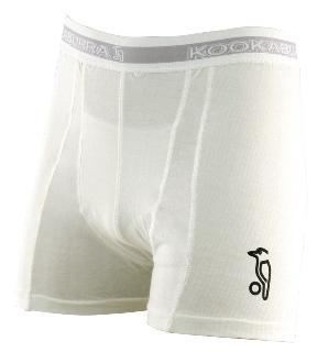 The Kookaburra Protective Shorts Without Padding are white, men's boxer brief-style shorts with a gray branded waistband, black penguin logo on the left leg, and an abdo guard pouch for extra cricket protection.