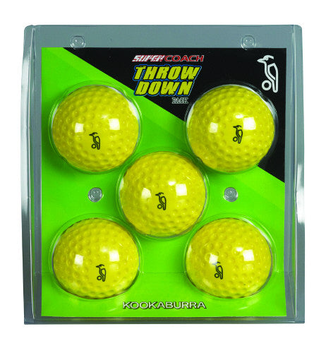 The Kookaburra 5 Pack Throw Down Yellow Balls features five dimpled balls with a black bird logo, neatly packed in a plastic case—perfect for use in bowling machines or throwing drills.