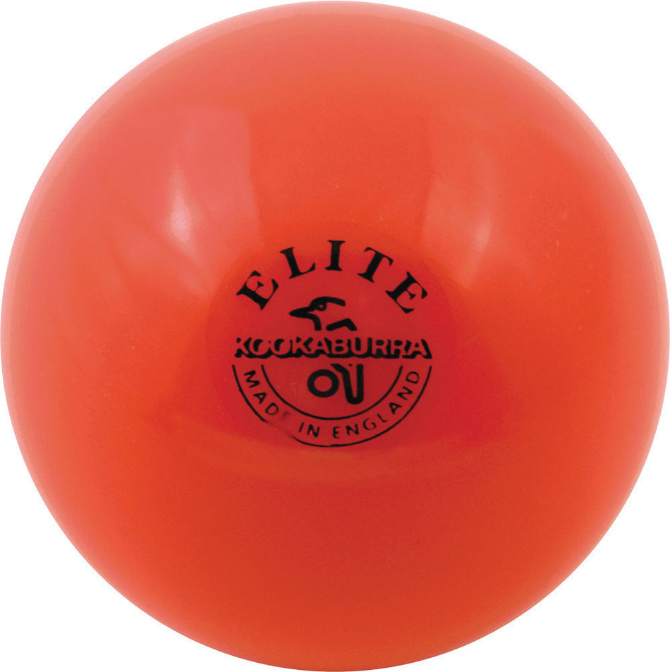 An orange Kookaburra Elite Indoor Hockey Ball with the brand name and a bird logo in black printed on its surface.