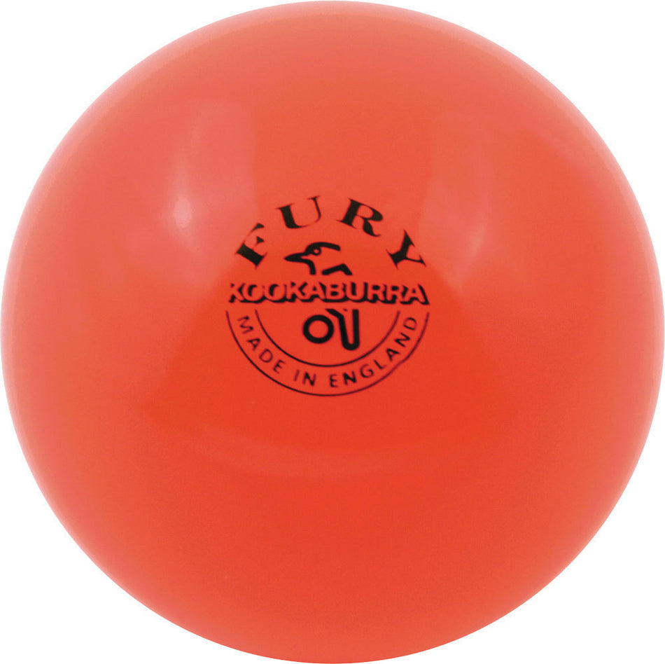 The Kookaburra Fury Mini Hockey Ball is a bright orange ball by Kookaburra with "Fury Kookaburra Made in England" and a bird logo printed in black, shown against a white background.
