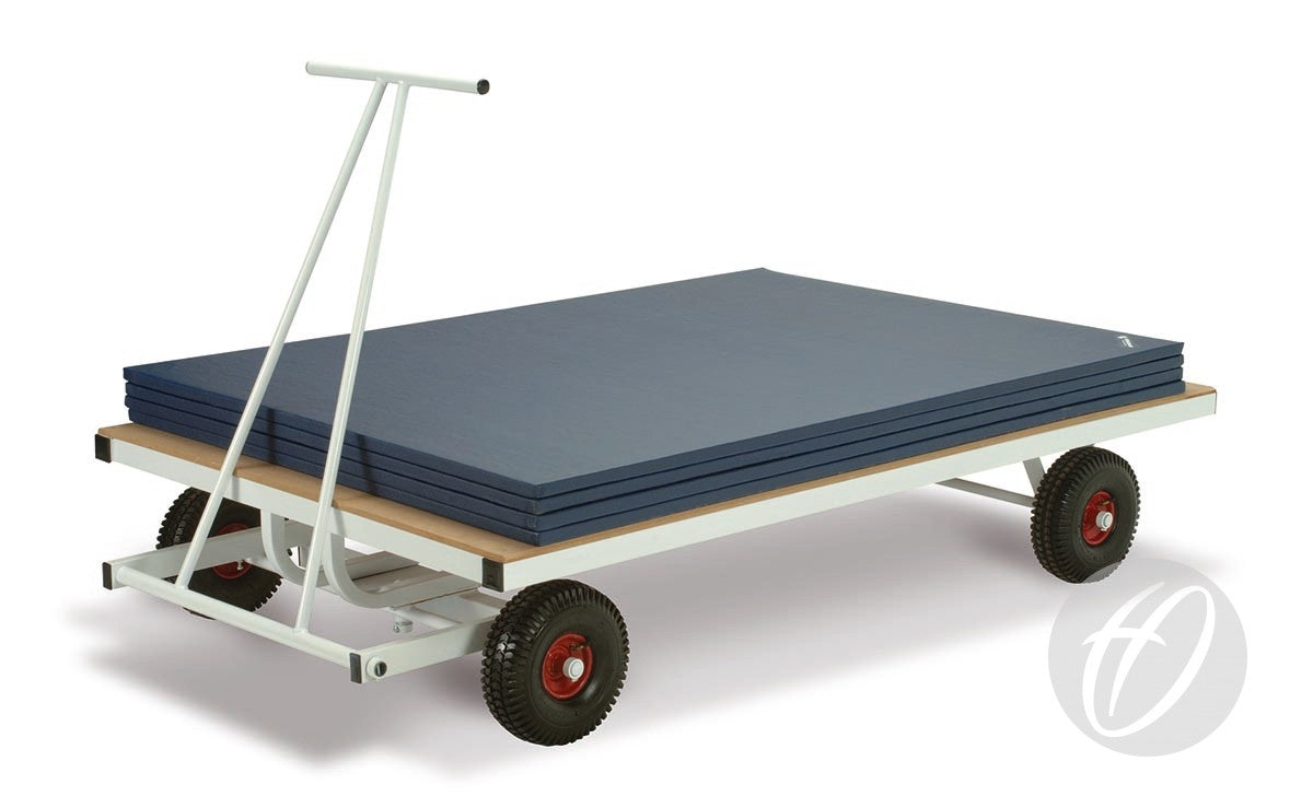 The Harrod Sport Super Heavy Duty Trolley features a white metal frame and handle, four black and red wheels, and easily transports stacked blue gym mats—ideal for gyms needing increased load capacity.