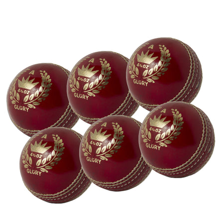 The MBS Glory Cricket Ball Six Pack by Martin Berrill Sports features six maroon balls with gold crown logos and stitched seams, arranged on a white background—ideal for club training or practice sessions.