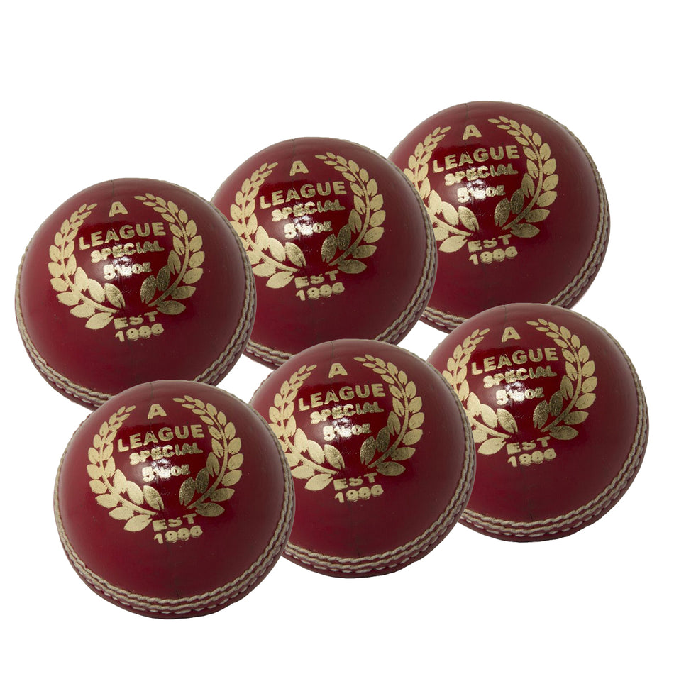 Six MBS League Special Senior red cricket balls by Martin Berrill Sports, in a 6 pack, feature white stitching, gold text with a laurel wreath reading "A League Special" and "Est 1996," arranged in two rows.