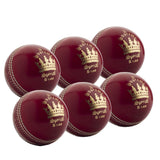 Six handmade red leather cricket balls with gold crown logos and "Supreme Syprial 5 1/2 oz" text, arranged in two rows. The MBS Supreme Special Six Pack by Martin Berrill Sports is a top choice for league cricket. Four-piece construction.