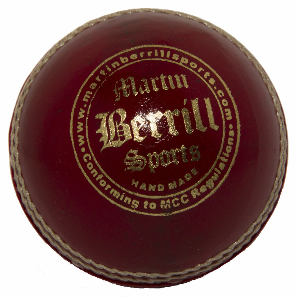 The MBS Insignia Cricket Ball by Martin Berrill Sports is a red leather club match ball with white stitching and gold text, conforming to MCC regulations.