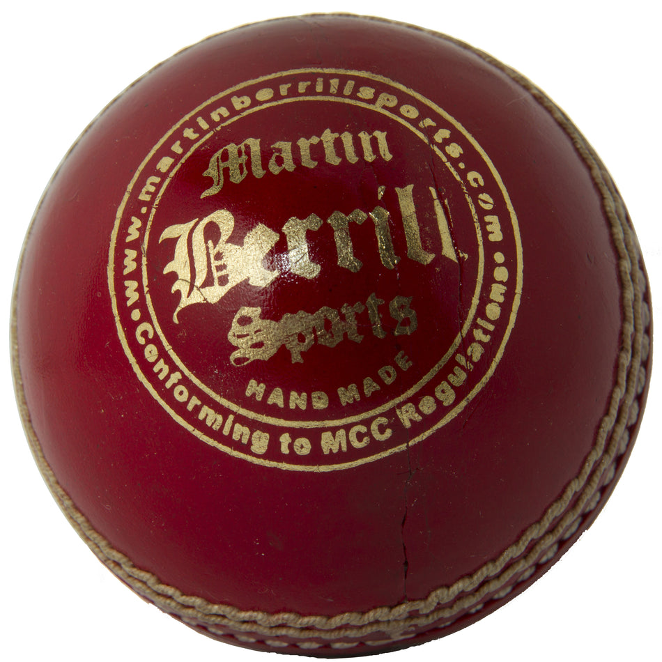 A close-up photo of the MBS League Special Cricket Ball by Martin Berrill Sports shows red leather with white stitching and gold branding, ideal for senior school cricket and compliant with MCC regulations.