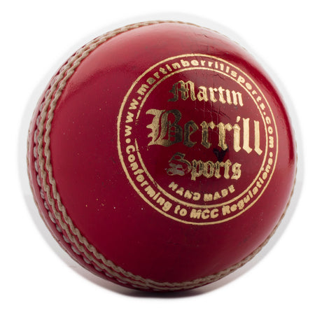 A close-up of the MBS Supreme Crown Cricket Ball, handcrafted from leather with prominent white stitching and gold Martin Berrill Sports branding, plus additional writing along the top edge.
