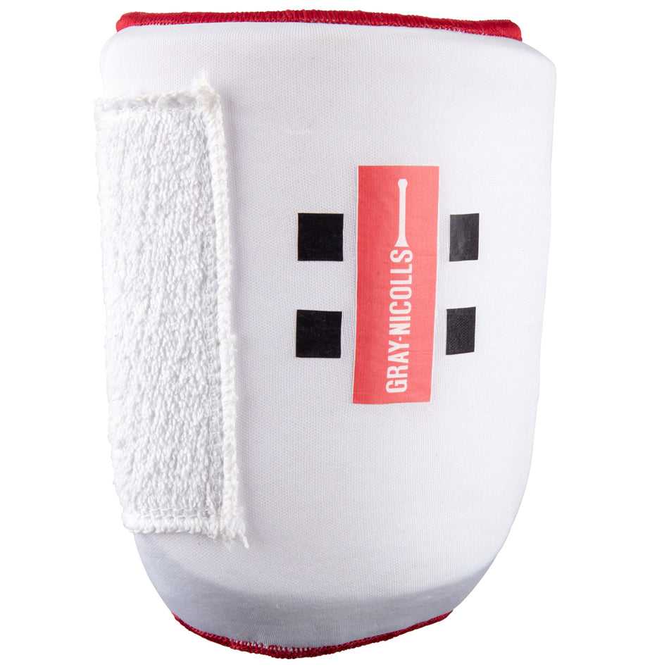 The Gray Nicolls Mini Pro Armguard is a white padded arm guard with a red logo, black squares, and a textured Velcro strap, providing ideal protection for the arm when facing fast bowling.