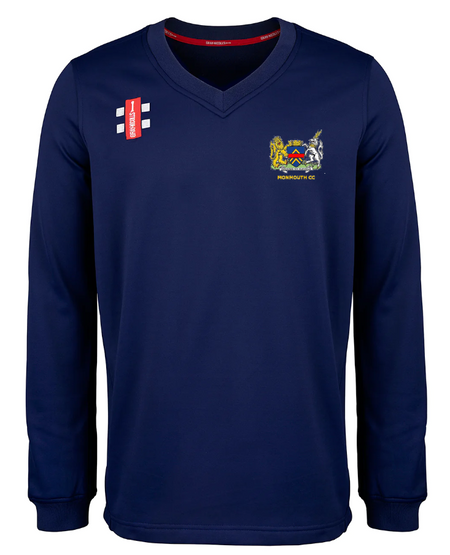 Navy blue long-sleeve Monmouth CC Pro Performance Sweater by Gray Nicolls, featuring a V-neck, crest and "Rhondule CC" text on the left chest, plus two small red and white logo patches on the right chest and shoulder. Ideal for serious players.