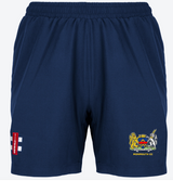 The Gray Nicolls Monmouth CC Velocity Shorts Women's feature an embroidered lion and unicorn crest with "MONMOUTH CC" on the right leg, plus a red and white striped patch on the left—ideal for stylish, high-performance training.