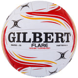 The Gilbert Flare Netball is a Size 5 white match ball with red, yellow, and black swirl patterns, black star graphics, bold Gilbert branding, and Fusion Technology for elite performance.