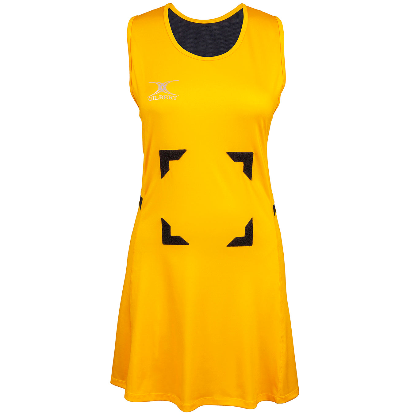 The Gilbert Synergie Netball Dress is sleeveless and yellow, featuring black neck trim, black velcro patches on the front, and a small white Gilbert logo on the left chest.