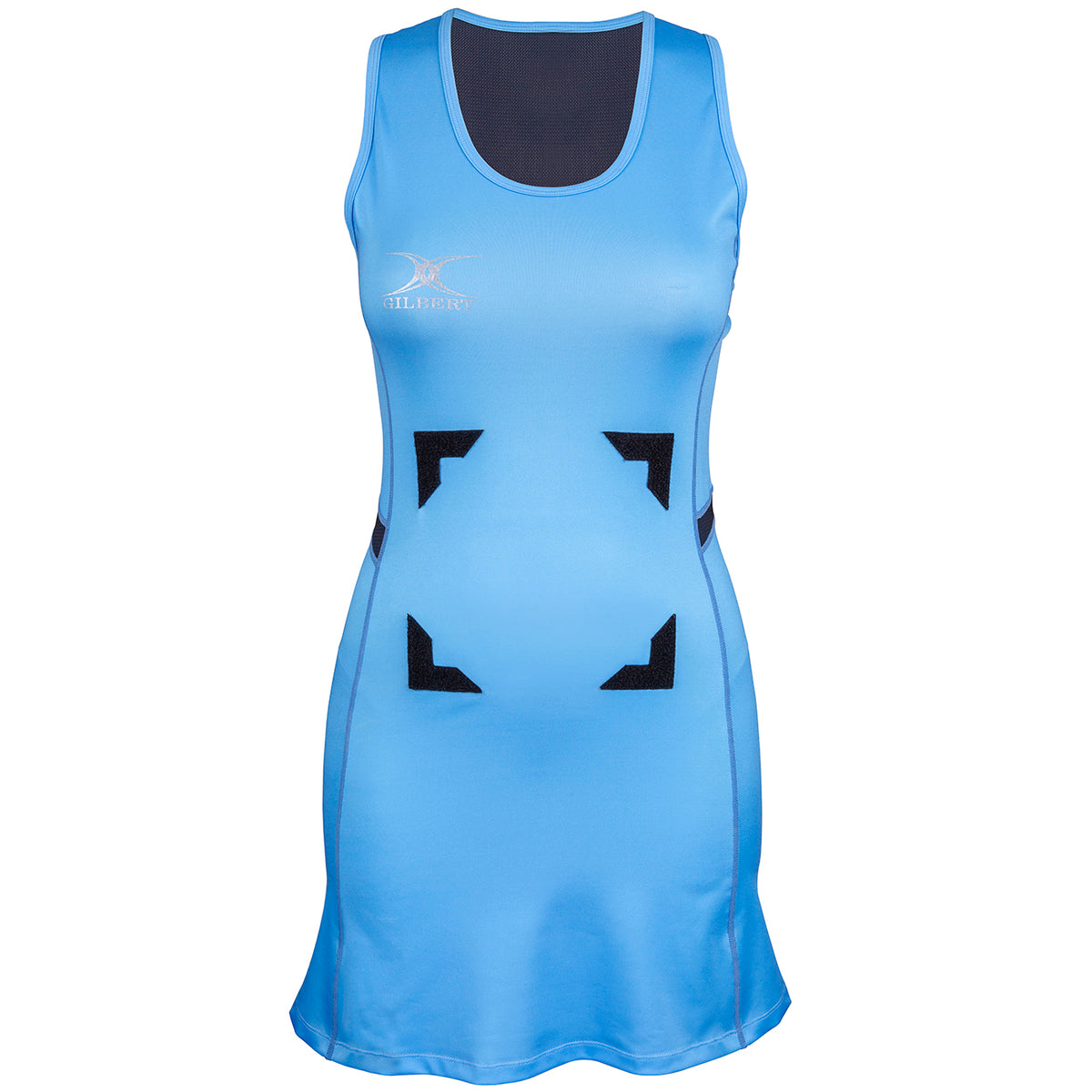The Gilbert Synergie Netball Dress is a sleeveless blue dress featuring a black collar, black side panels, two sets of black Velcro patches for position bibs, and the Gilbert logo on the upper left chest.