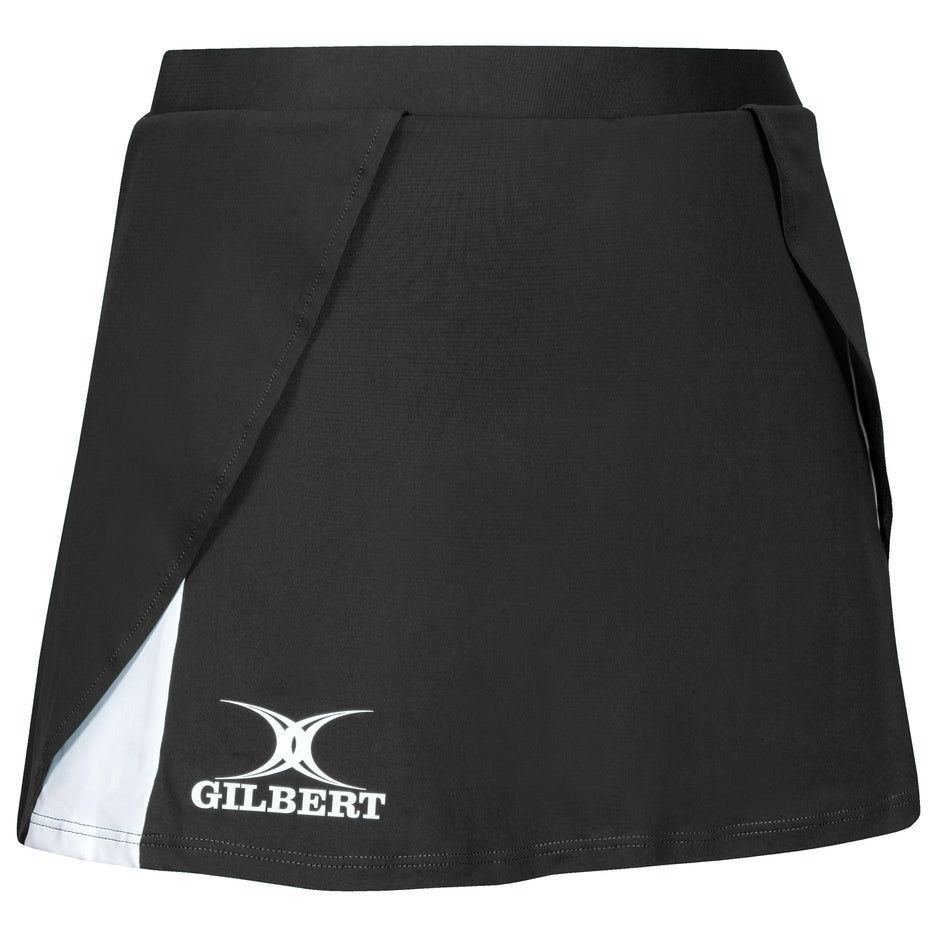 The Gilbert Helix Netball Skirt is a black skirt with a stylish wrap-over design, a white accent on the lower left side, and the Gilbert logo in white near the hem.