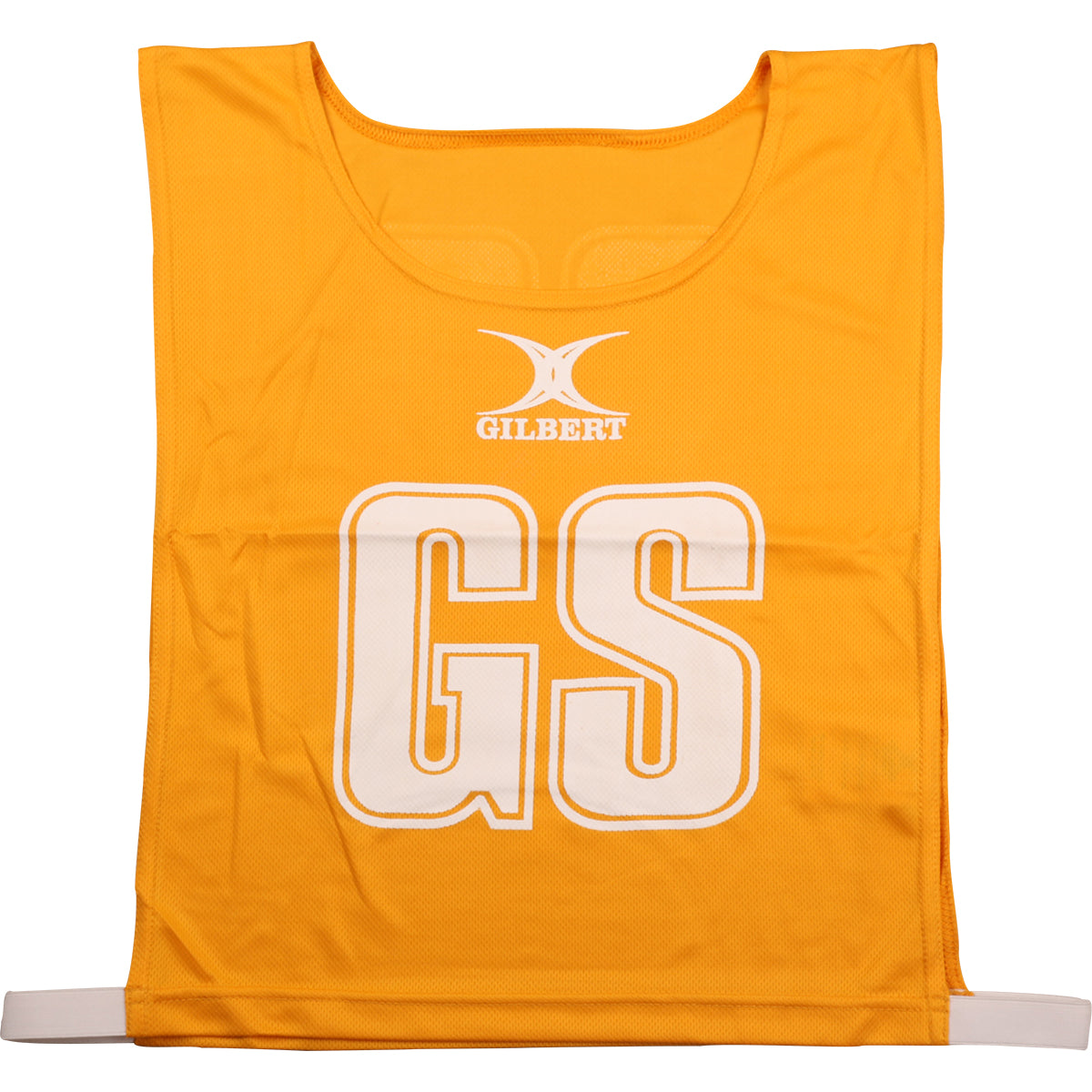 The Gilbert Netball Bibs in amber are made from breathable polyester, featuring "GS" in large white letters on the front with the Gilbert logo above—part of the official Gilbert collection.