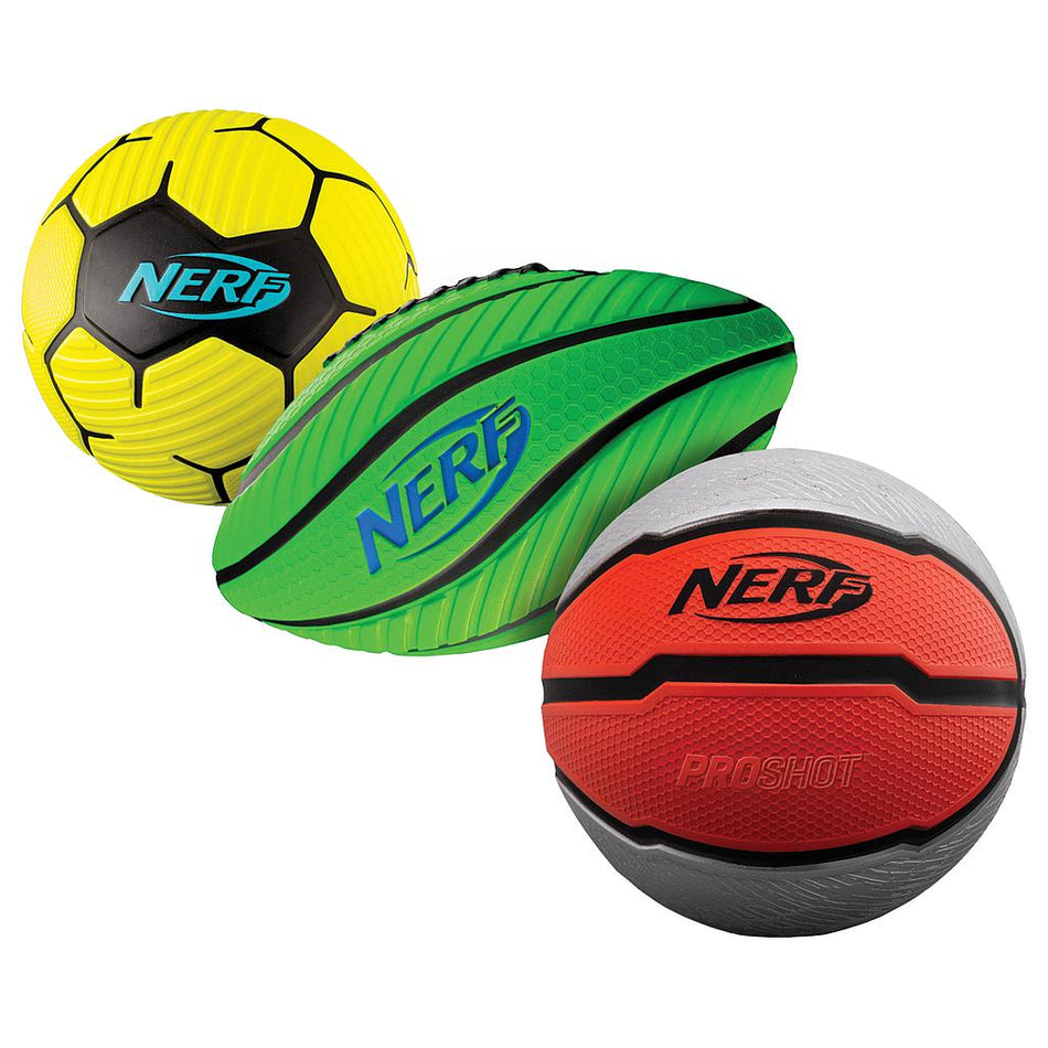 The Nerf Proshot Multisport Foam Ball Set by Nerf includes three soft foam balls: a yellow and black soccer ball, a green and black mini football, and a red, black, and gray basketball marked “Proshot.”.