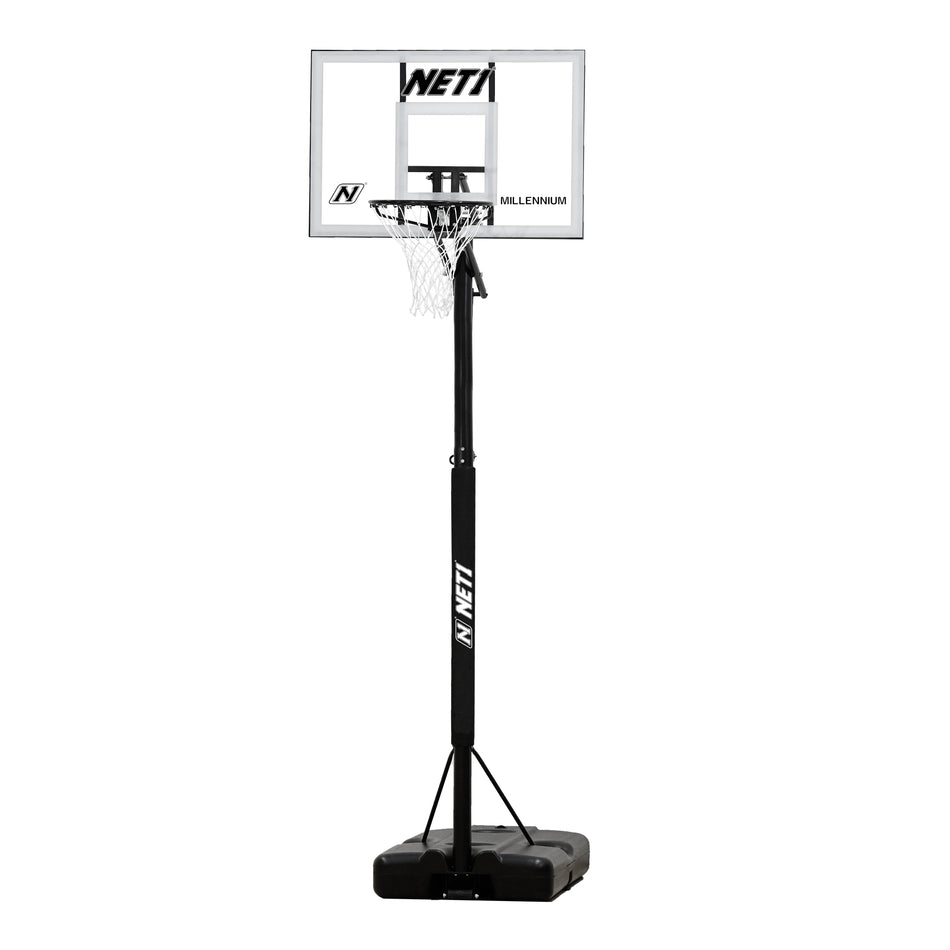 The Net1 Millennium Portable Basketball System features a clear polycarbonate backboard, black pole and base with wheels for easy movement, plus an adjustable hoop. The Net1 brand appears on both the pole and backboard.