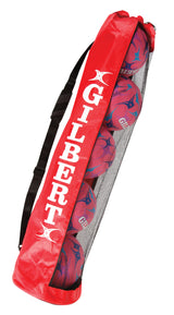 A red Gilbert Ball Tube from Gilbert, featuring a mesh design and shoulder strap, is filled with pink and blue balls.