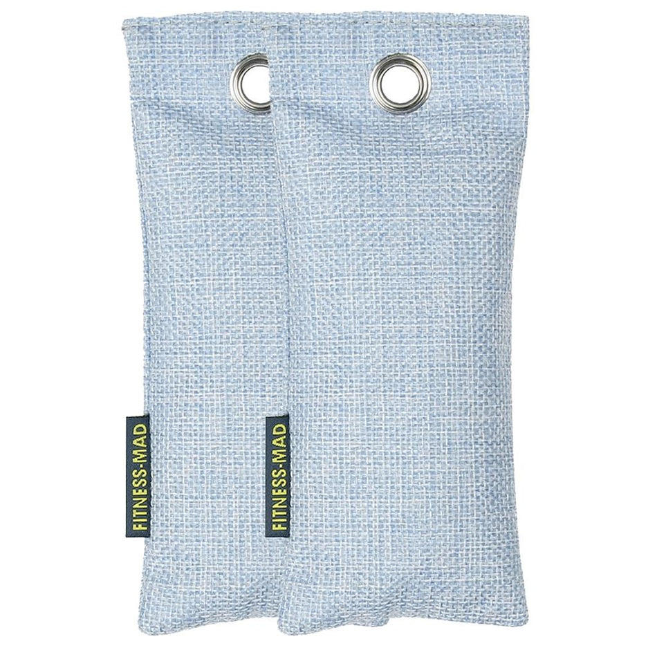 Two light blue rectangular pouches with textured fabric and metal grommets, branded "Fitness Mad," serve as effective sports odour absorbers or boxing glove deodorisers.