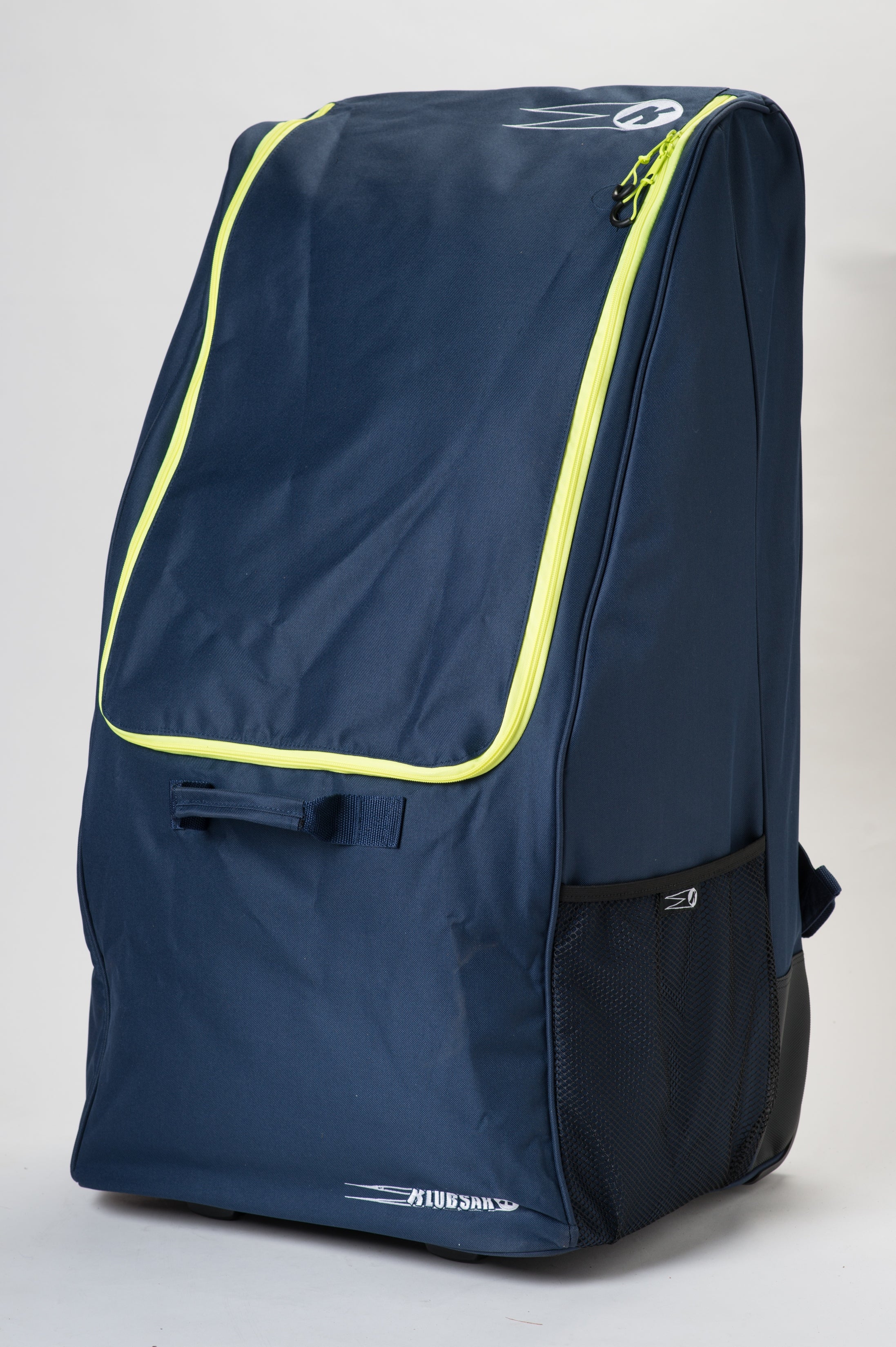 The Katchet KoachSak Pro is a large navy blue sports bag featuring a neon yellow zipper, front handle, mesh side pocket, and subtle white logos on top and lower front, shown against a plain white background.