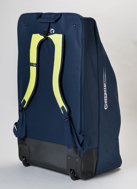 A large navy blue Katchet KoachSak Pro sports bag with black wheels stands upright on a plain background, featuring yellow backpack-style straps and a side logo.