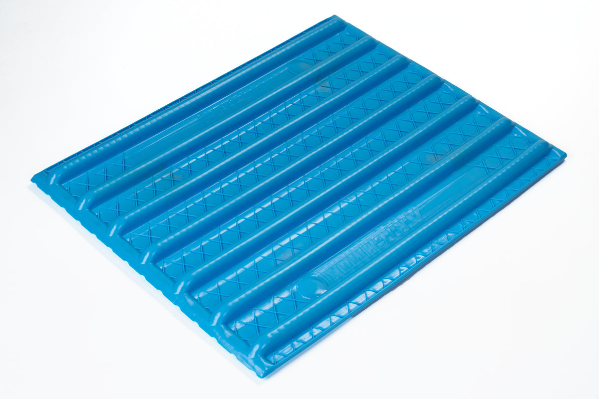 The Katchet KatchMax is a blue, rectangular plastic training tray with raised ridges and textured patterns for cricket fielding practice, shown on a white background.