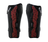 A pair of Precision Training Origin.0 Strap Shin Guards in Black/Red, featuring geometric patterns and high impact protection, designed for sports safety and labeled ORIGIN 0.