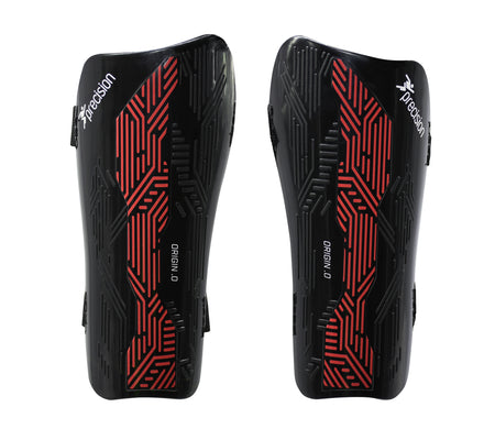 A pair of Precision Training Origin.0 Strap Shin Guards in Black/Red, featuring geometric patterns and high impact protection, designed for sports safety and labeled ORIGIN 0.