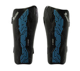The Precision Training Origin.0 Strap Shin Guards in Black/Cyan feature blue geometric patterns, "precision" printed in white on the top left, and provide high-impact protection while staying lightweight.