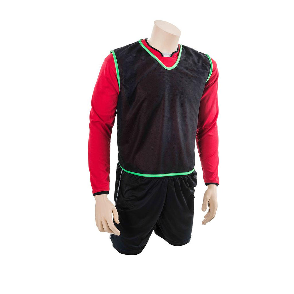 A headless mannequin wears a red long-sleeve shirt, black shorts, and the Precision Mesh Training Bib by Precision Training in black with green trim, displayed on a plain white background.