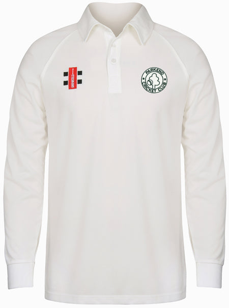 The Parkend CC Matrix V2 Long Sleeve Shirt by Gray Nicolls is a white, collared cricket shirt with a green circular club logo on the left chest and a red and black patch on the right, made from moisture-wicking fabric for comfort.