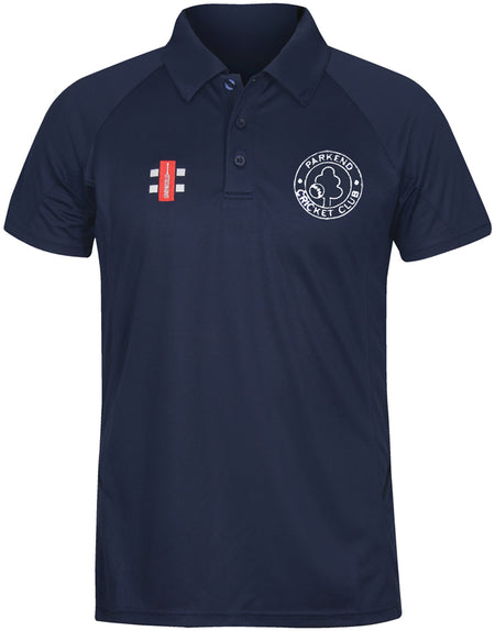 The Parkend CC Matrix V2 Polo Shirt by Gray Nicolls features a navy blue design with the club logo on the left chest, a small red cricket emblem on the right, and offers moisture management, a collar, and three buttons for active training.