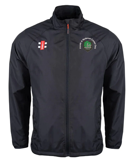 The Gray Nicolls Penallt & Redbrook CC Velocity Rain Jacket is black with a high collar, an embroidered cricket club logo on the left chest, a red and white emblem on the right, and water-repellent material to keep you dry.