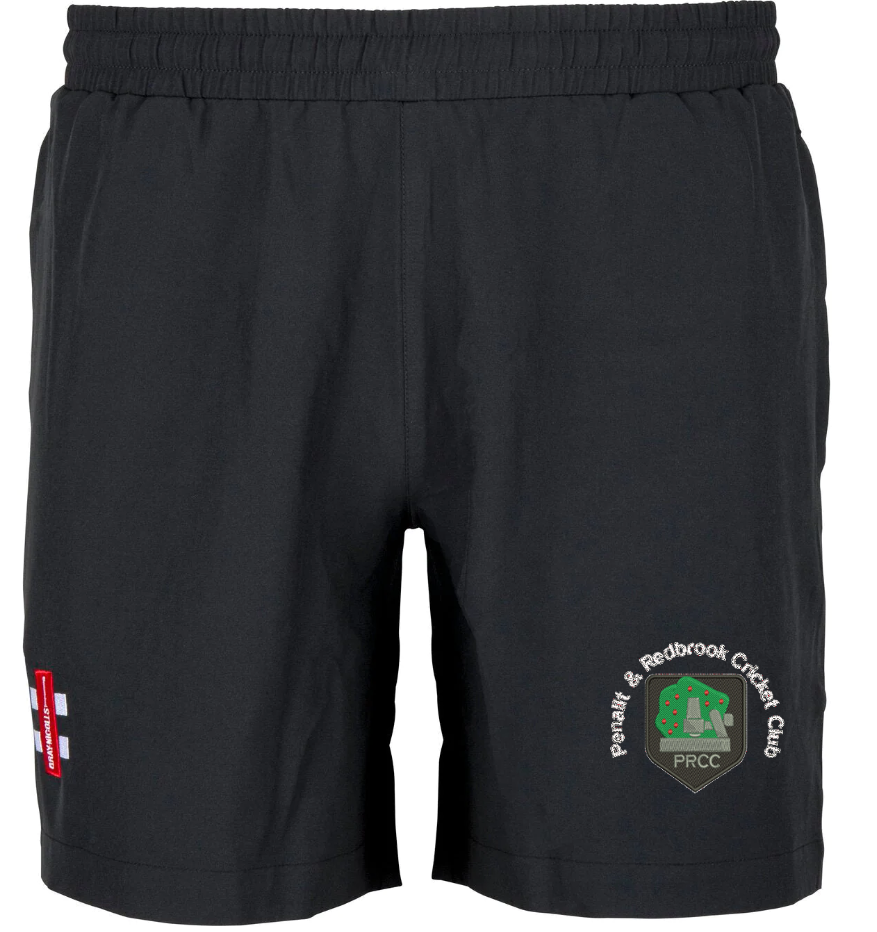 The Gray Nicolls Penallt & Redbrook CC Velocity Shorts are black cricket training shorts with an elastic waistband, featuring the PRCC embroidered logo on the left leg and a small red and white patch on the right.