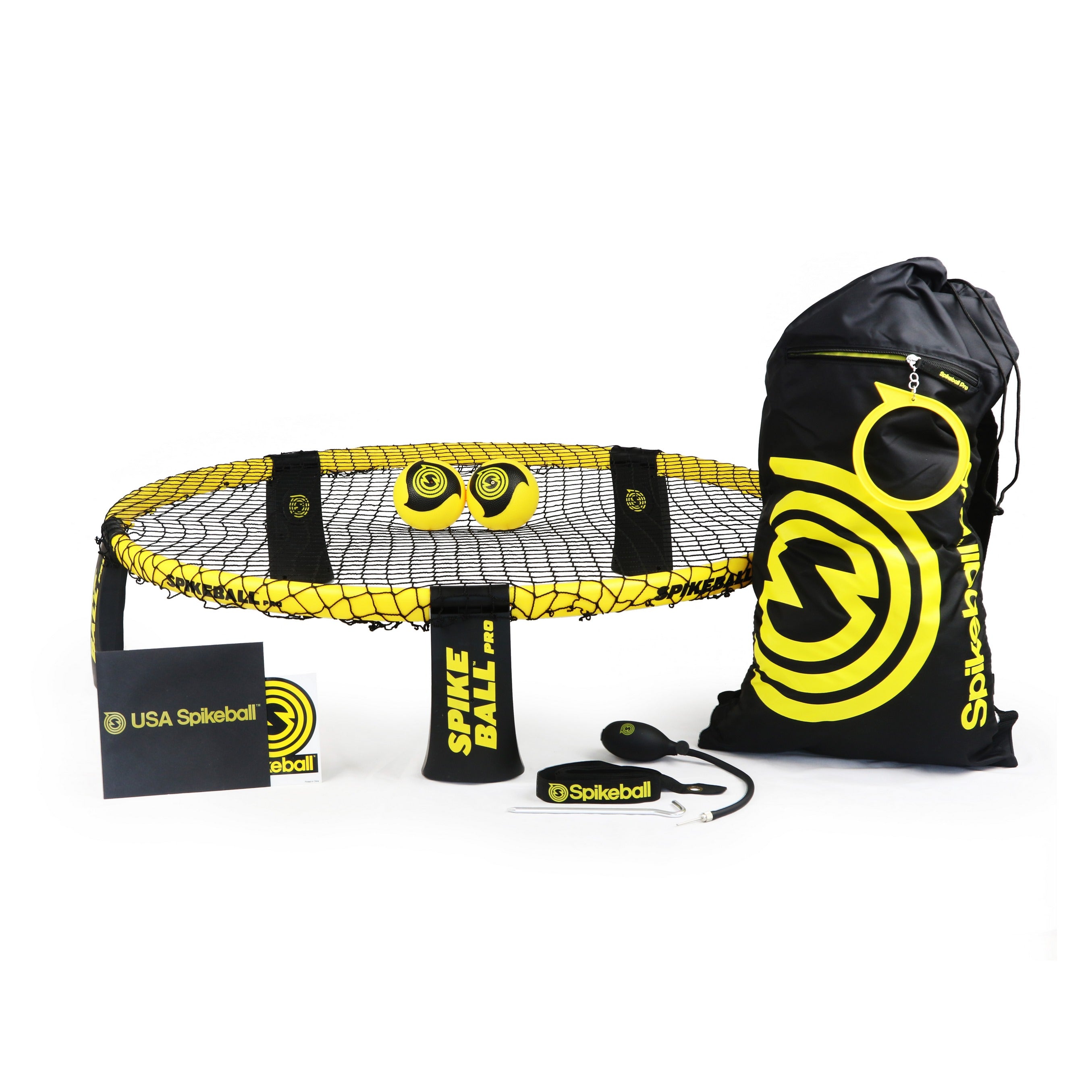 The Kankakee Spikeball Pro Set includes a round net with legs, three yellow balls, a drawstring bag, rule booklet, and accessories—all with the Spikeball logo in black and yellow. Ideal for any tournament set needs.