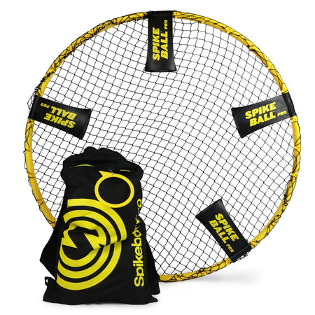 A round yellow Kankakee Spikeball Pro Set net with black netting and labeled pads stands upright, with a black and yellow Kankakee Spikeball carrying bag in front—ideal for competitive tournament play.