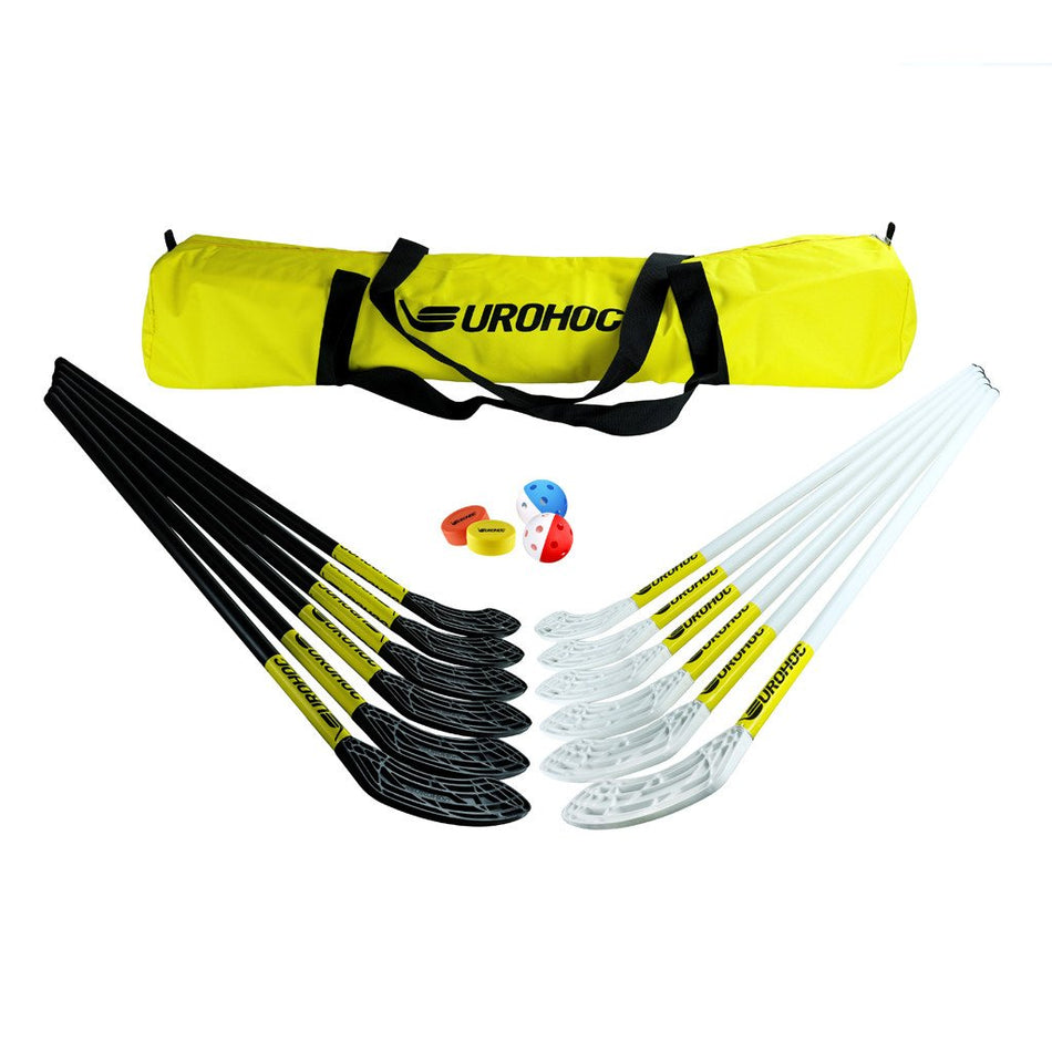 The Eurohoc Floorball Pro Set by Eurohoc features six black and six white sticks, two perforated balls (red and blue), two orange wristbands, and a yellow UROHOC bag—ideal for team games that build hand-eye coordination through active play.